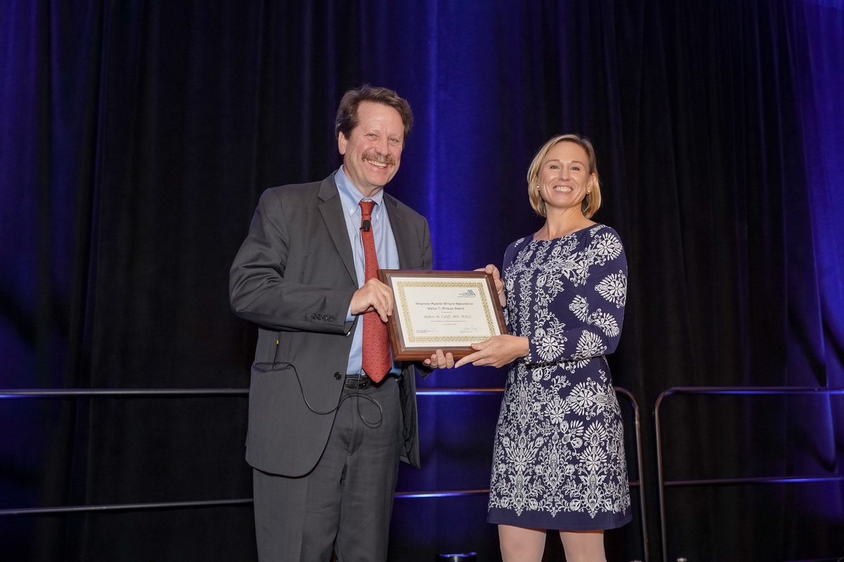 AmMedWriters's tweet photo. Dr. Robert Califf (@califf001) received the Alvarez Award at #AMWA2018 and spoke on combatting misinformation and improving America's health status - Congratulations and thank you for sharing your insights! https://t.co/mKNZ5jwIre