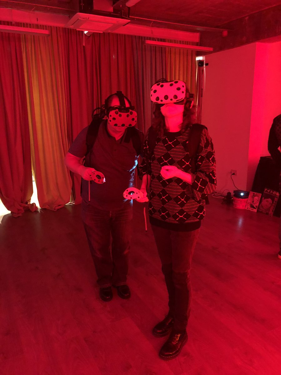 Kev_McLoughlin's tweet photo. Team night out in #VR at the @hyperreality12 pop-up in #shoreditch- lots of team building fun shooting zombies, solving puzzles and riding virtual roller coasters #AVtweeps https://t.co/QIjQ2I2dix