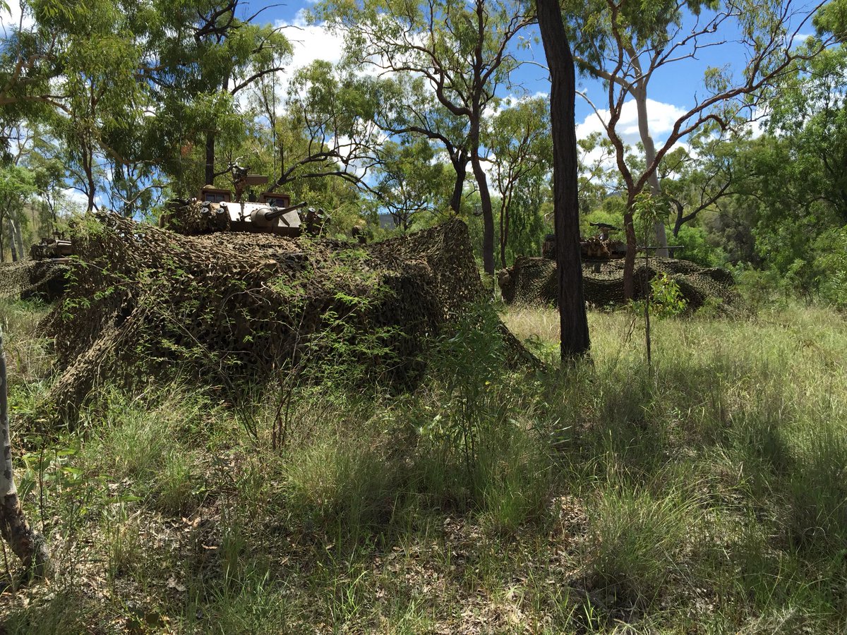 LewisCrothers's tweet photo. No question about the utility of cam nets on the contemporary battlefield. Our current methods are incredibly impractical. Great idea to develop tailor made canvas shrouds and camouflage systems for our vehicles #survivabilty #protection #deception #DEFAus18 https://t.co/1H87o1OhPg