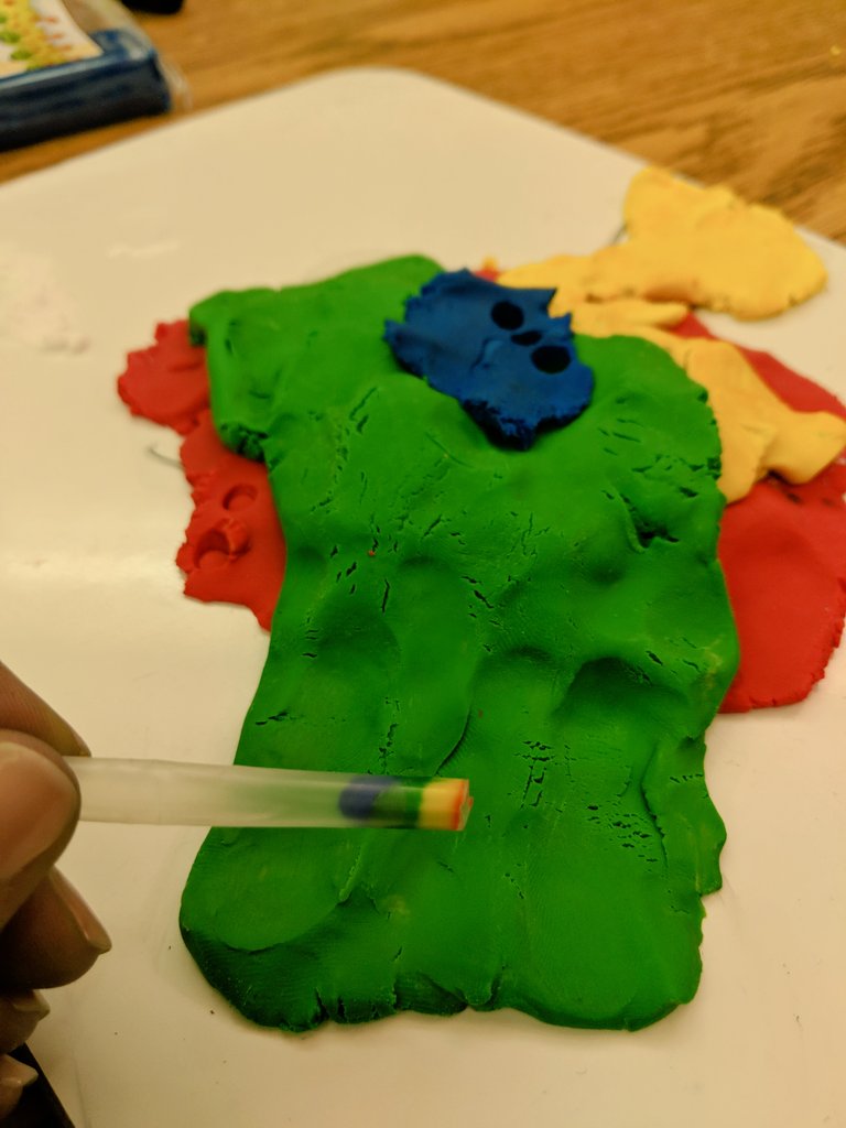 MrsKGardner16's tweet photo. I did this experiment last year my my kiddos to show how volcanoes create new landforms, but I like the addition of taking a sample of the layers @RiceU_STEM @conocophillips #REMSL https://t.co/WTo7I59YPY