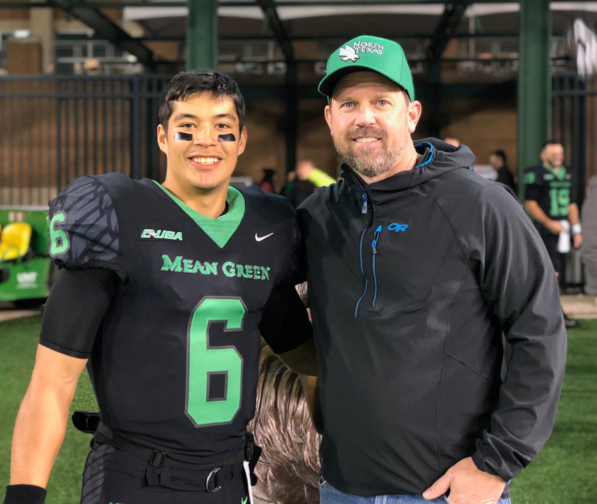 What a pleasure to meet and congratulate my man <a href="/Masonfine09/">Mason Fine</a>. Last Saturday he became UNT's all-time leading passer, surpassing my 24-year-old record; then he followed it up with a hard-fought, gutsy win tonight. A real treat meeting his parents, too. <a href="/TerrahFine/">Terrah Fine</a> <a href="/MeanGreenFB/">UNT Football</a>