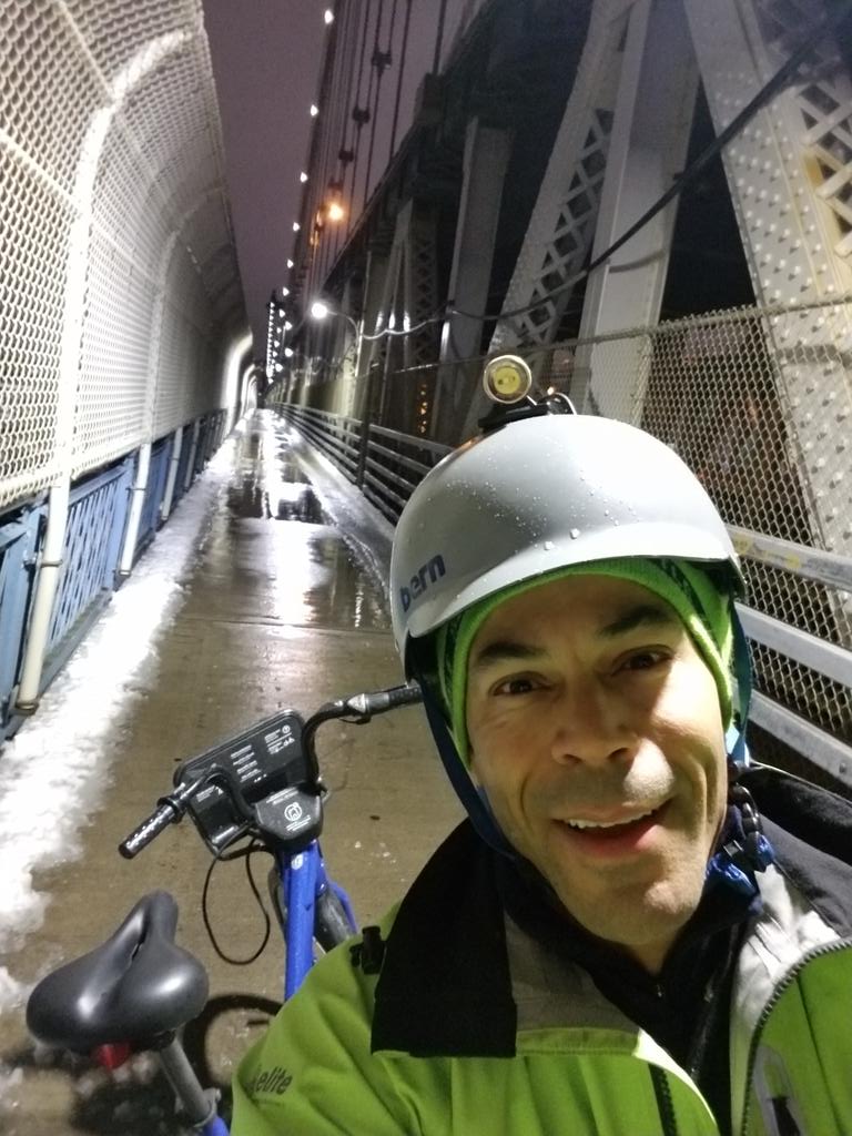 Tokumbo's tweet photo. @NYC_DOT thank you for keeping #ManhattanBridge safe for 2-wheel commuters during #FirstSnow https://t.co/HA6Ctv8FoE
