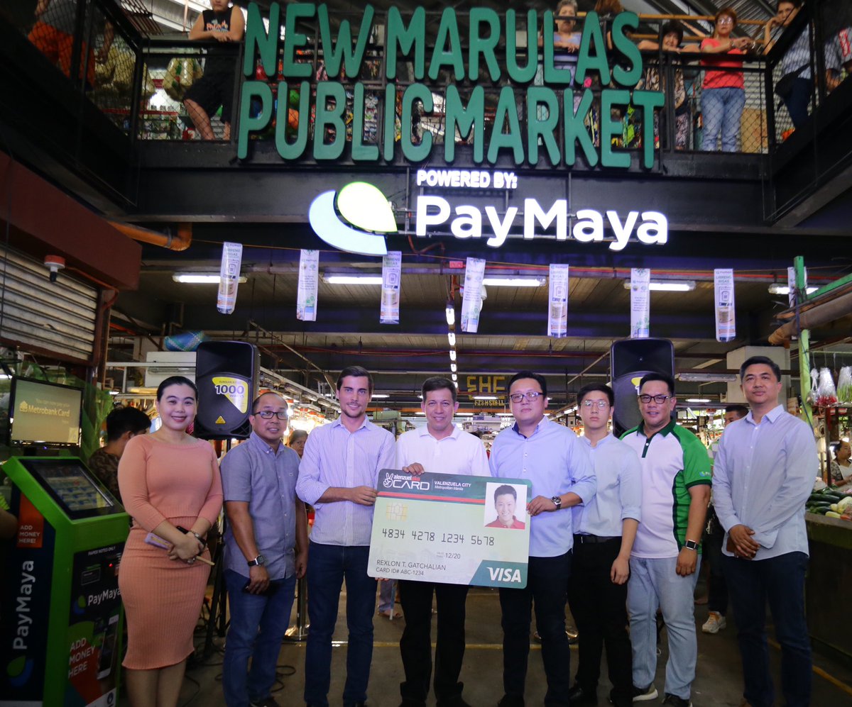 PHVoyager's tweet photo. Get ready to pay for vegetables, fruits, and meats at the public market as PayMaya officially powers the New Marulas Public Market in Valenzuela with QR payments! The exclusive Valenzuela Ako Card ID or VCARD will also be available soon for residents. #ValenzuelaLovesPayMaya https://t.co/XlcfXNuR7h