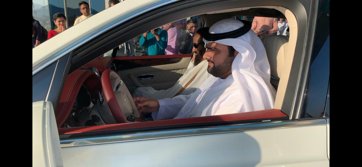 Gurudev's tweet photo. The Crown Prince HH Mohammed bin Hamad bin Mohammed Al Sharqi and his brother HH Rashid bin Hamad bin Mohammed Al Sharqi drove me around the old city of Fujairah and showed me the historical monuments. https://t.co/8iufviDjIF