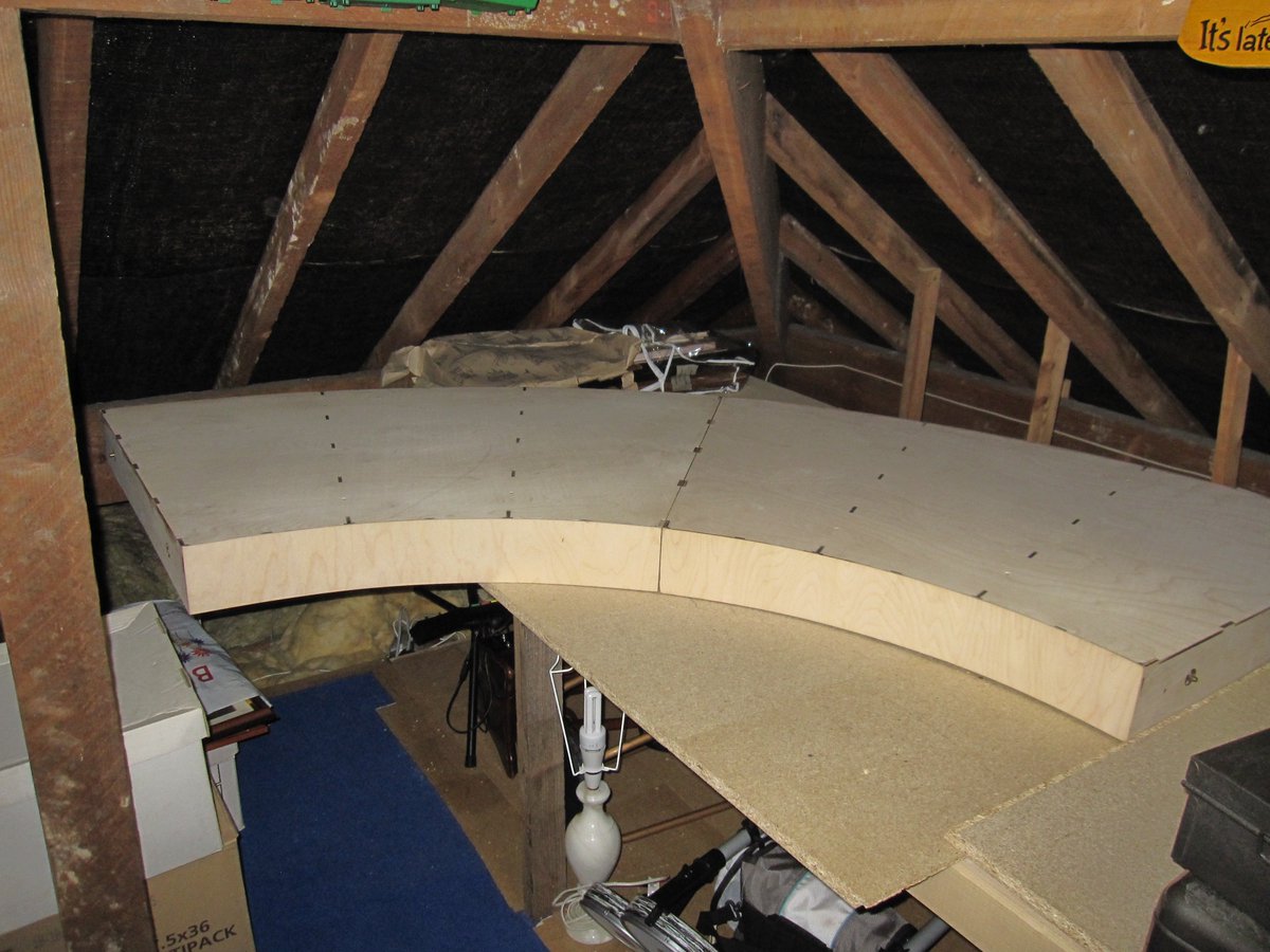 RussPurdie's tweet photo. @dale_gauge @baby_pendo @VirginTrains @ModelRailClub These are the #timhorn baseboards delivered to me last month by the man in person !! bit of a squeeze to get them in the loft but at least the project has started !! only problem is working in Dubai so it will be a little slow to get started https://t.co/aLIbx0YLBk