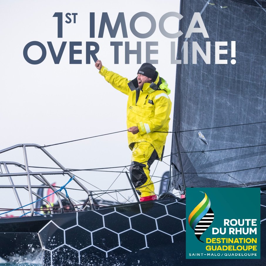 ATRacing99's tweet photo. Alex &amp; HUGO BOSS cross the finish of @routedurhum The 1st @IMOCA60 and 1st monohull! #RdR2018 🙌🙌 https://t.co/Md9d0gqdZQ