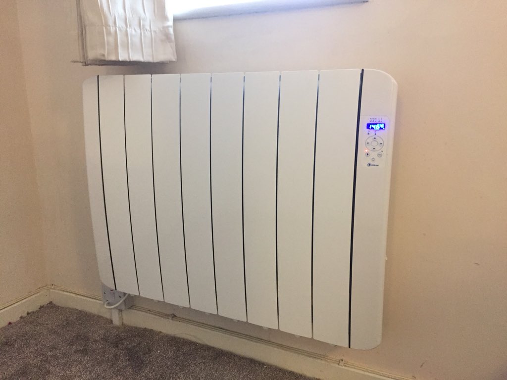 PMCornish's tweet photo. Out with the old, in with the new!! Old storage heater removed and replaced with a new @HaverlandUK Electric Radiator. This should keep them warm through winter. https://t.co/7tH2bJEzCI