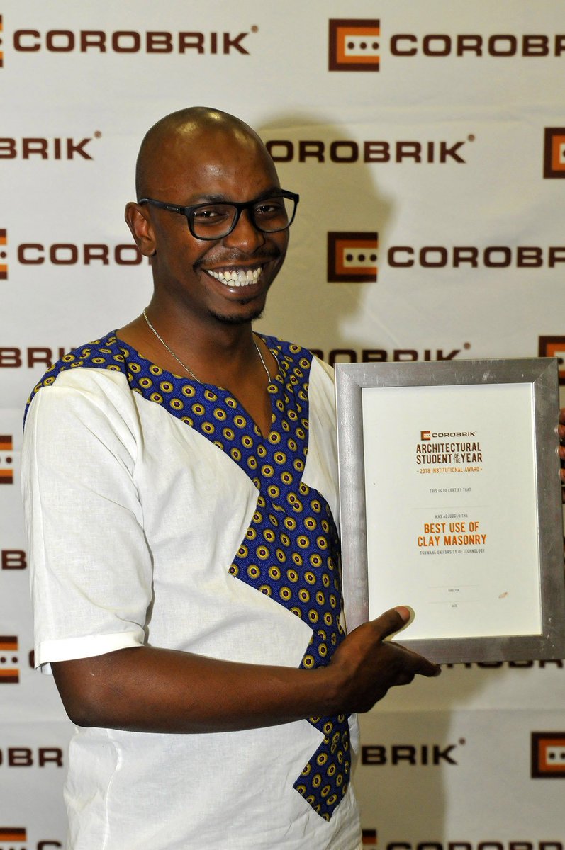 TUT_Arch's tweet photo. Congratulations to Siyanda Nkosi on receiving the #TUTArch2018 #Corobrik prize for the best use of brick in his design of a Centre for Intangible Heritage of Zulu Culture at the Royal National Park @ArtsCultureSA @ProudlySA @pretorianews @Official_TUT @amiraosman0 https://t.co/rqHCc5boOP