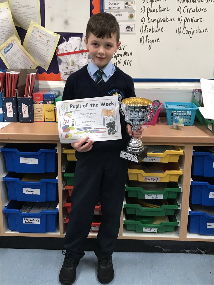SJBPS11's tweet photo. Lewis from @naomheoinclg and @SJBPS11  got pupil of the week and wants to let his hero @AontroimGAA @PatrickMcBride5 know! #aspirebelieveachieve 🇹🇿🔵⚪️ https://t.co/ZOoMDg9WMW