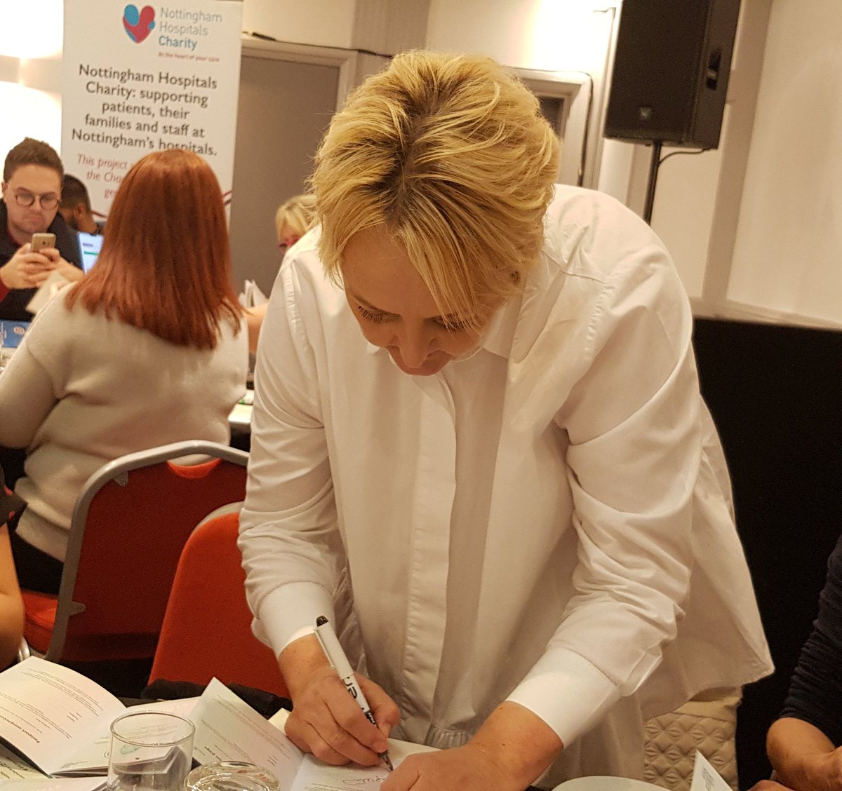 Mandie Sunderland Signing the passport #NUHPPMPassport