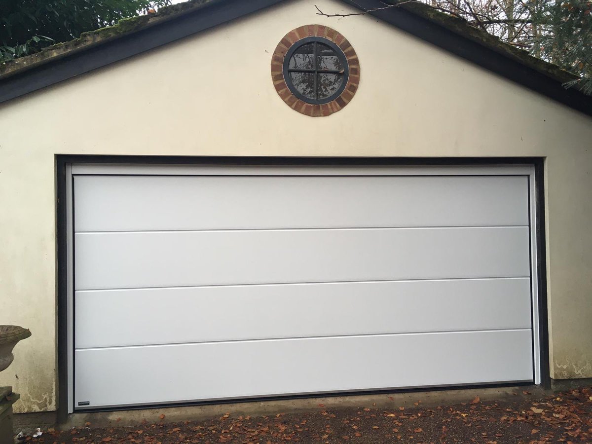 DoormaticGarageDoors tweet media