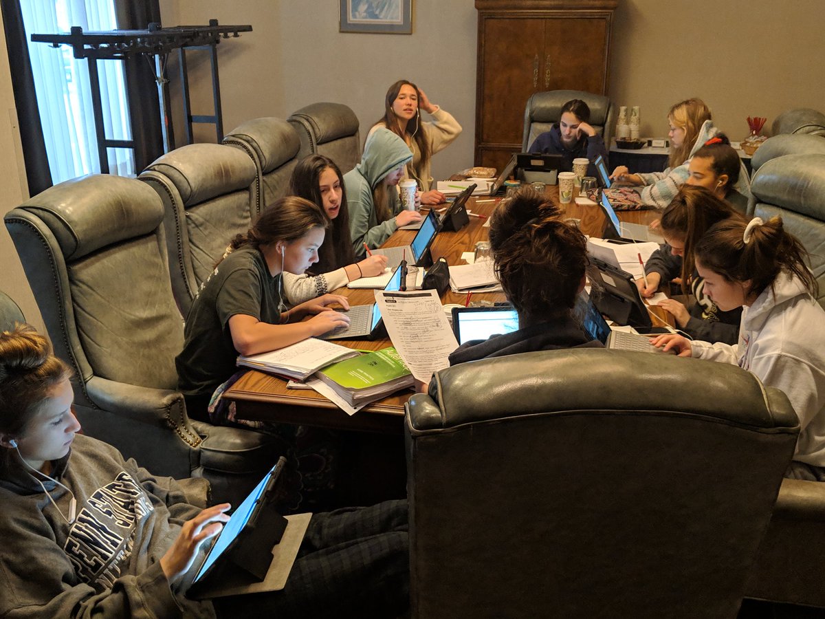 NDPvball's tweet photo. Putting the student in student-athlete. Girls working hard to keep up on their school work btn matches. Excellence in the classroom, community, and on the court. Irish Volleyball https://t.co/PW0AtjWFSy