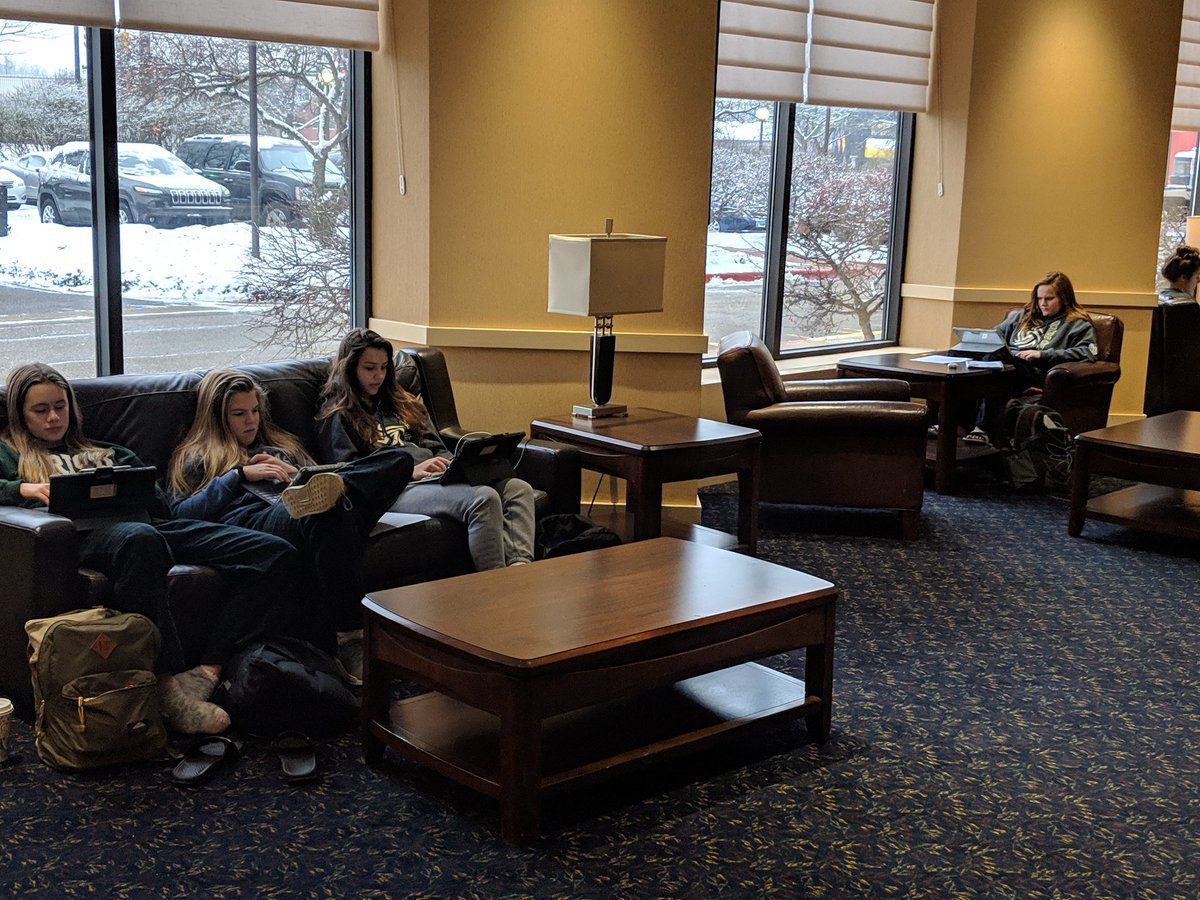 NDPvball's tweet photo. Putting the student in student-athlete. Girls working hard to keep up on their school work btn matches. Excellence in the classroom, community, and on the court. Irish Volleyball https://t.co/PW0AtjWFSy