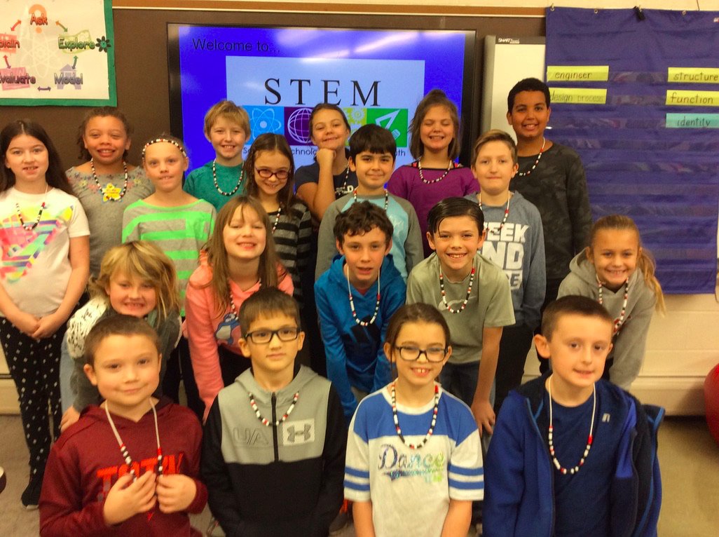 orchardtech's tweet photo. 4th Graders seem to love their necklaces made in STEM class - their names are in binary code! (Fairfax Elementary) https://t.co/Q9AqiB3PMl