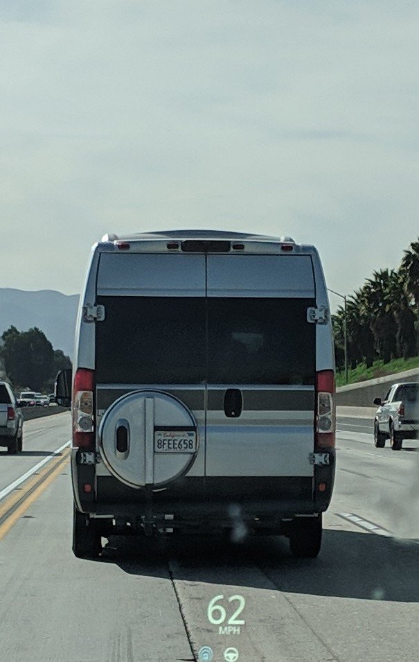 nireson's tweet photo. The clowns in this van think it's funny to block the left lane at 62 mph, repeatedly using the HOV lane to move ahead, then parking in the left lane when it ends, backing up the freeway, mocking the angry drivers they've blocked when they can finally get by. True assholes. https://t.co/0FoU9Mp10r