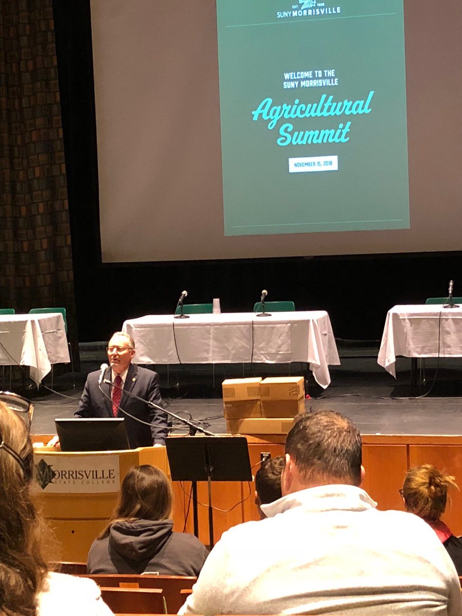 SouthernTier8's tweet photo. Thank you @sunymorrisville for hosting the 2018 Agricultural Summit yesterday! Pictured below: Commissioner of Ag. and Markets Richard Ball,  panel of SUNY Morrisville Students, and Keynote Speaker; Zaid Kurdeich of Norwich Meadows Farm LLC. The future and present of Agriculture! https://t.co/ELSR3Nd4Mg