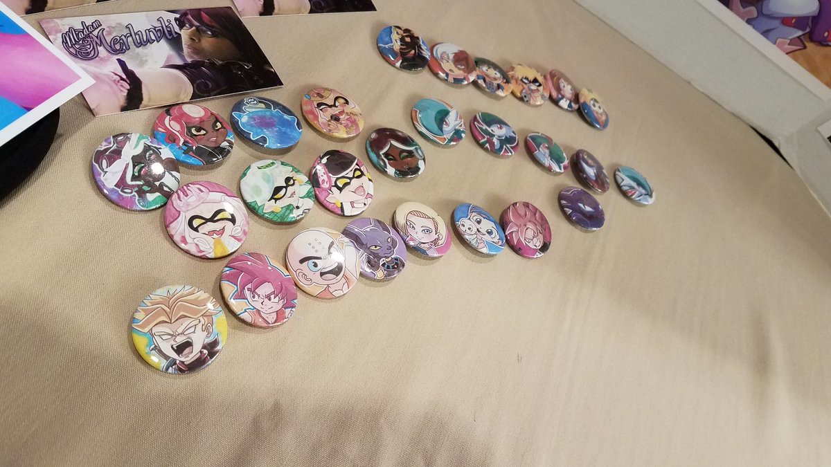 TakeZeroTV's tweet photo. We are all set up right outside Main Events!
We've got #splatoon, #dbz and #dbs, #pokemon, cosplay prints of merluvli, #mha, and more! Buttons, stickers and prints! Come check it out and don't forget Anime Taxonomy starts in 1 hour with our very own @ThursdayPancake! https://t.co/xfLeos1cYe