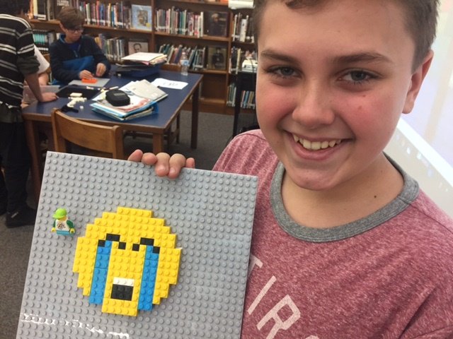 Library_HMS's tweet photo. @AliSchilpp #LEGOTravelBuddy is having an awesome time at @Hereford_MS helping @McShaneSara Ss make pixel pics to illustrate & narrate their Bold Action Story w/ @voicethread ! #bpslms #iBelong https://t.co/b9an9uVcCl