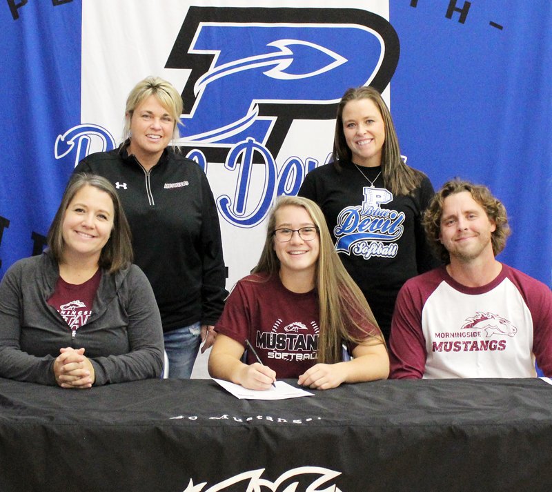 Plattsmouth senior Alyx Curran-Lewis signed a letter of intent this afternoon to play softball at Morningside College.