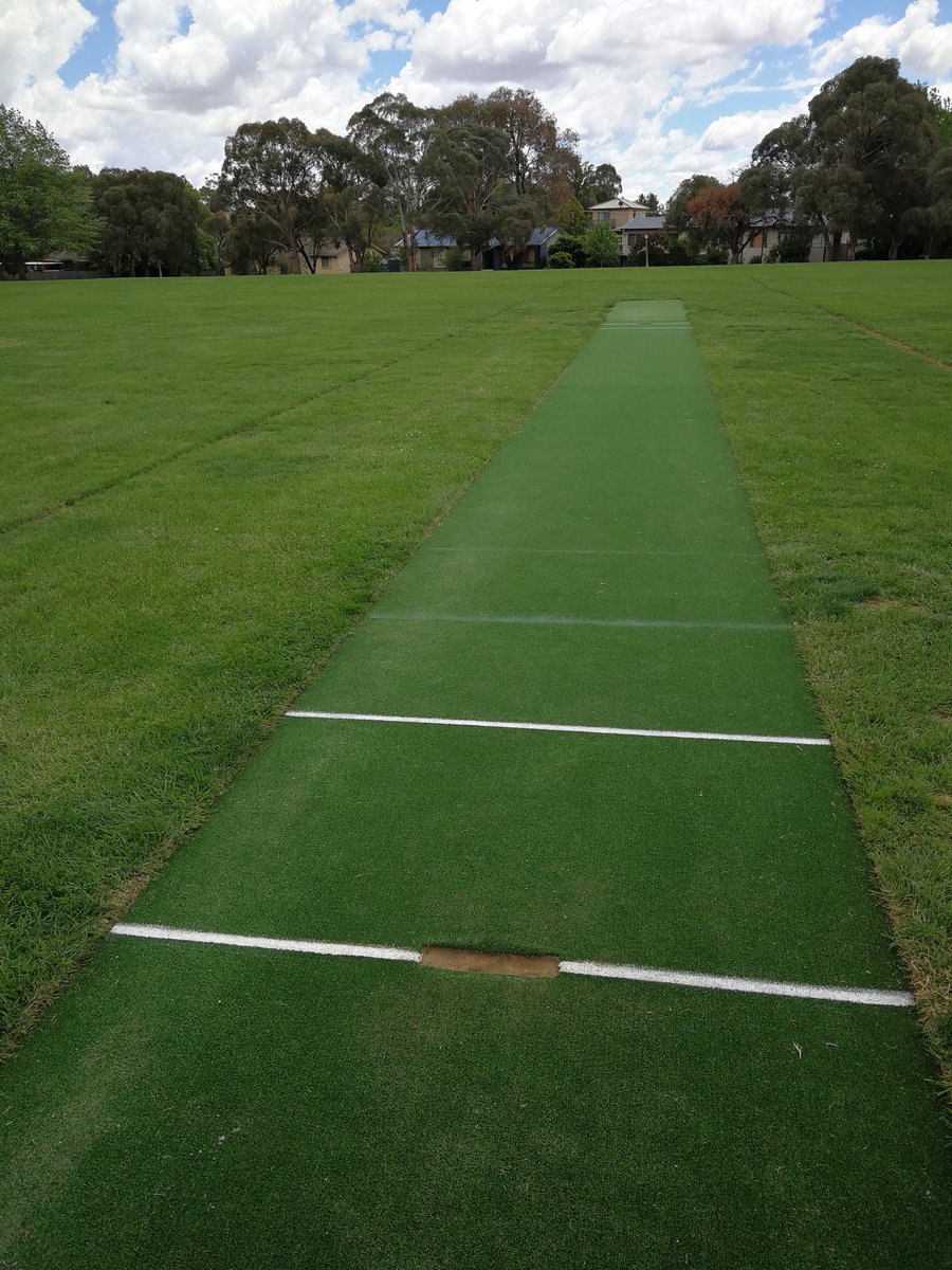 grimmetts's tweet photo. @NCGCC And it's a lovely day at Latham 104 for 5s Blue v top of ladder Ginninderra Black. If we MUST play on syntho nice to see no stone left unturned finding a good one 🤣 https://t.co/FdY89AiN4z