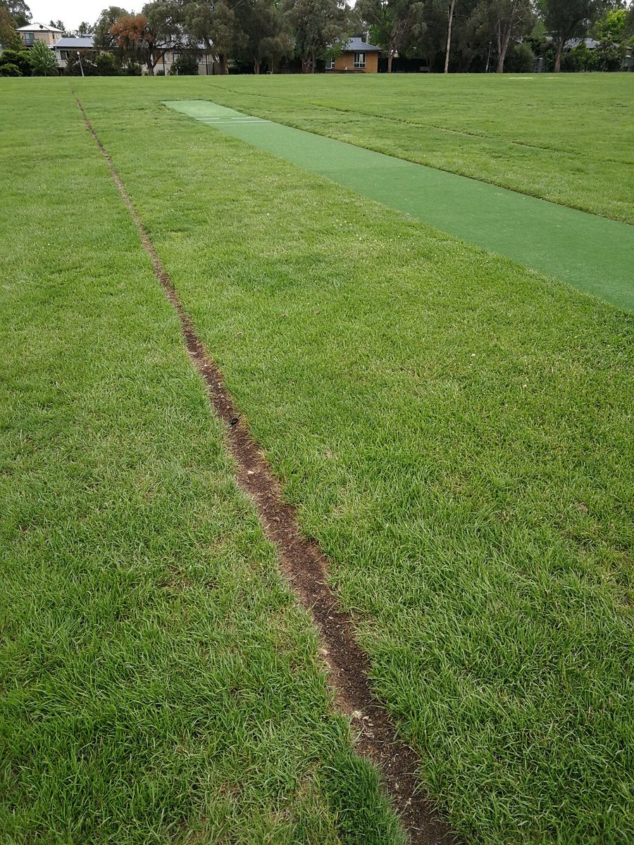 grimmetts's tweet photo. @NCGCC And it's a lovely day at Latham 104 for 5s Blue v top of ladder Ginninderra Black. If we MUST play on syntho nice to see no stone left unturned finding a good one 🤣 https://t.co/FdY89AiN4z