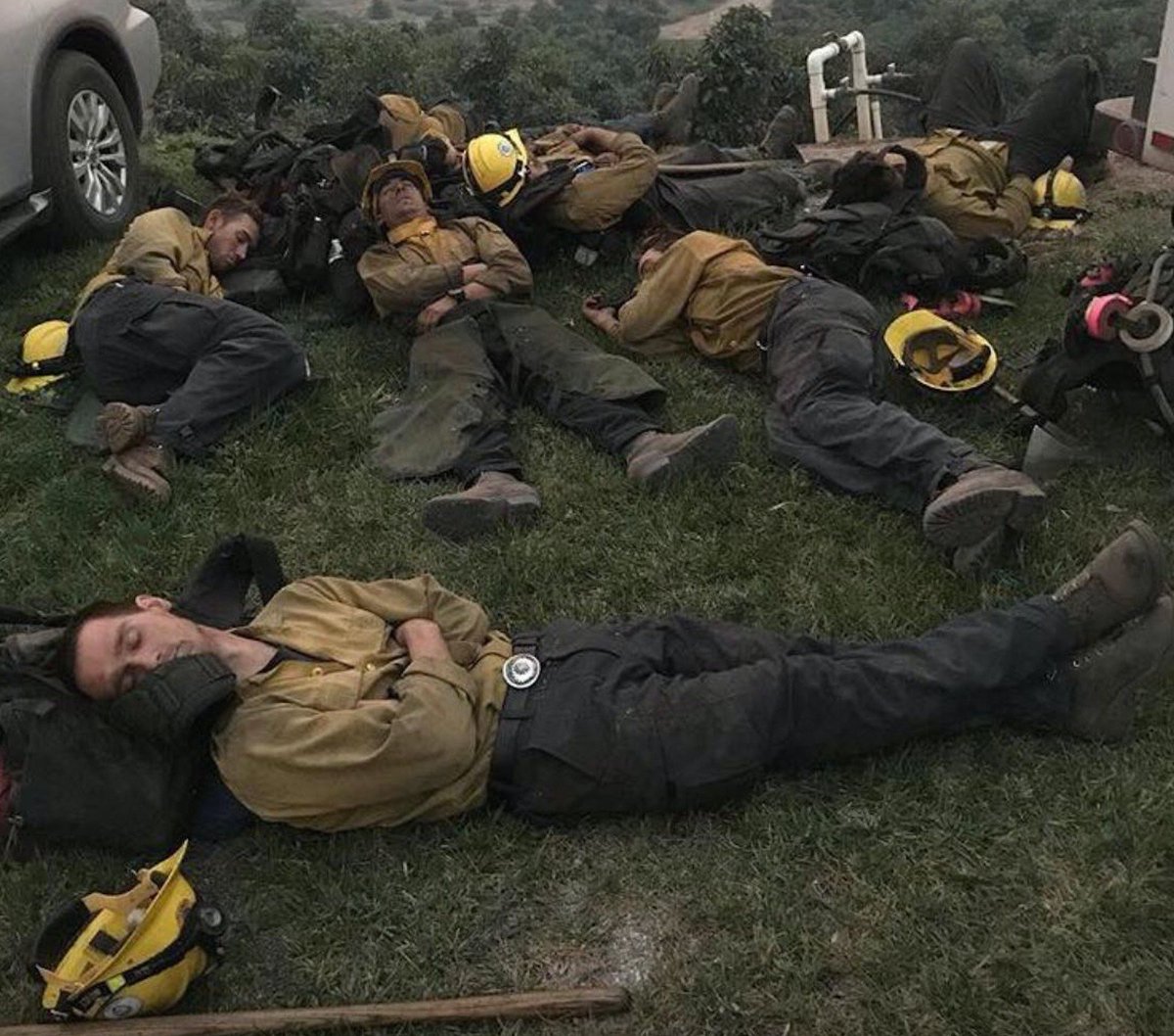 _SJPeace_'s tweet photo. Picture of exhausted fire fighters who are working around the clock to put out the wild fires in california.

As a survivor of a house fire myself, I owe my life to one of them. ❤️

RETWEET YOUR SUPPORT FOR THESE AMAZING MEN 😭 https://t.co/cIWJU3VjaG