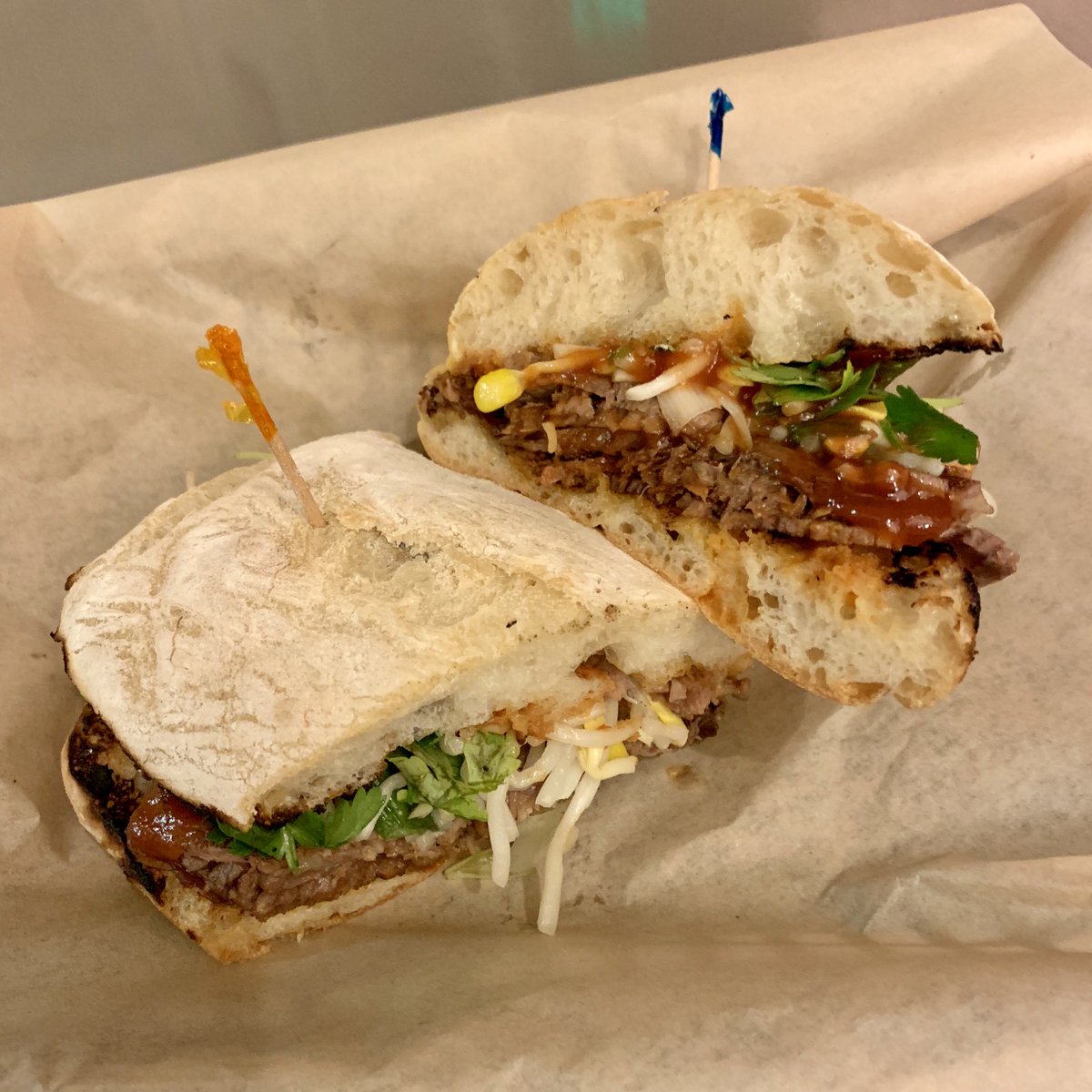 DevilsDill's tweet photo. Weekend Special! Slow-braised Chili-garlic Beef Brisket, Tamarind BBQ sauce, Spicy Pickled Bean Sprouts, Fresh Cilantro.  Get it at https://t.co/RQA09BYkFU or come in! https://t.co/6zkirncG0k