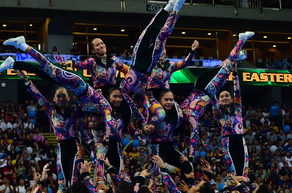 ABSCBNNews's tweet photo. @cedrickkbasco MOA Arena is back to the 70's with FEU Cheering Squad's routine #UAAPCDC2018 | via Mark Demayo, ABS-CBN News https://t.co/CSMJaFPfpw