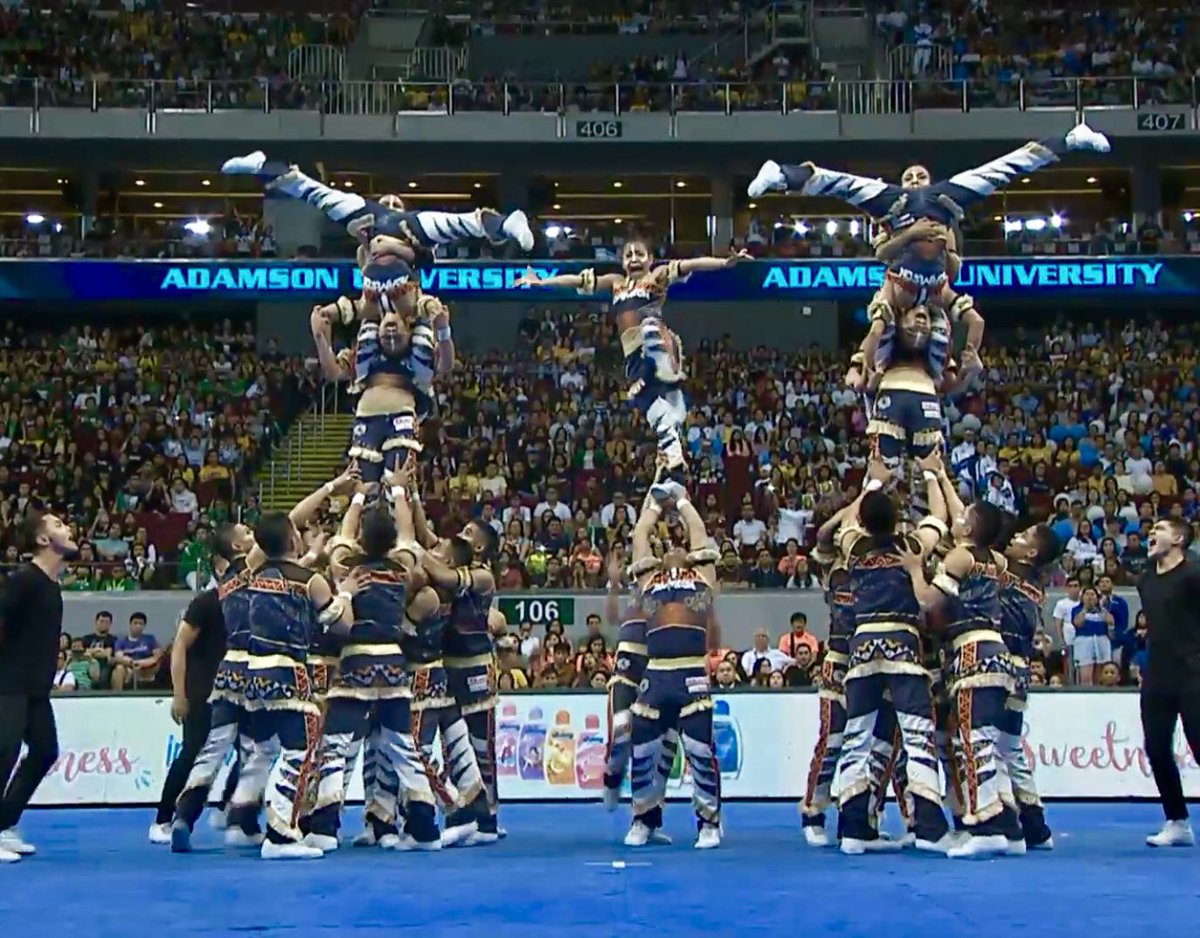 Senyora's tweet photo. MY TOP 3.
1st: NU #VamosNacionalU 
2nd: UST #DivaSantoTomas 
3rd: AdU #OrangeIsTheNewBlue 

Wala e, ibang level pinakita ng NU. Grabehan. Dat di na pinapasali yan. 
 #UAAPCDC2018 https://t.co/m5OqrpahkK