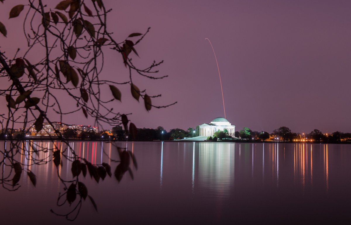 NASAWallops's tweet photo. .@northropgrumman's #Antares rocket was spotted over the Thomas Jefferson Memorial in Washington D.C. this morning. For more stunning images, check out @nasahqphoto on Flickr: https://t.co/bAkvR5dvIO. 📸: NASA/Aubrey Gemignani https://t.co/nfqhDHcqdS
