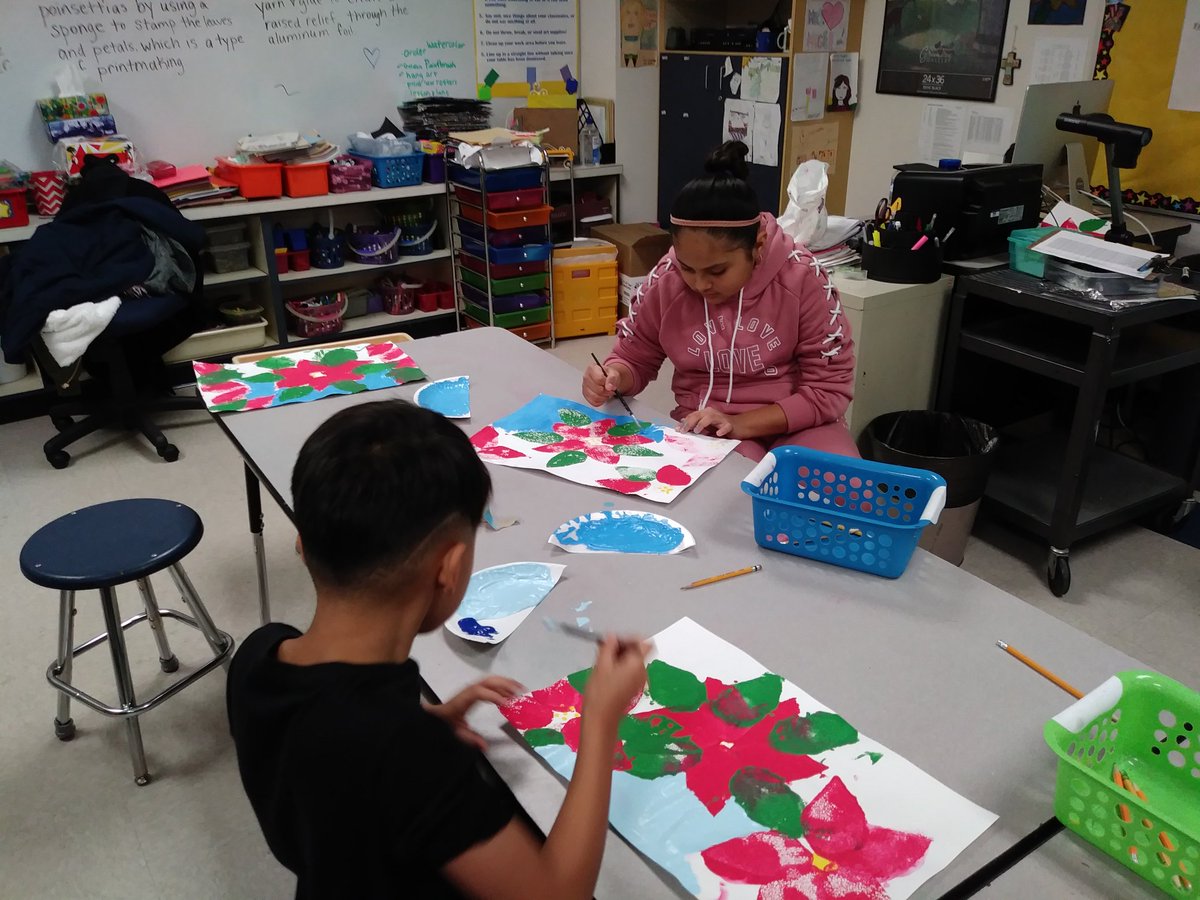 ArtwMrsMagee's tweet photo. Fourth grade Christmas Poinsettias using sponges as printmaking tools and talking about value as students mixed light blue paint for the background. #mesqart #ShandsEs https://t.co/FL5WPe0EsC