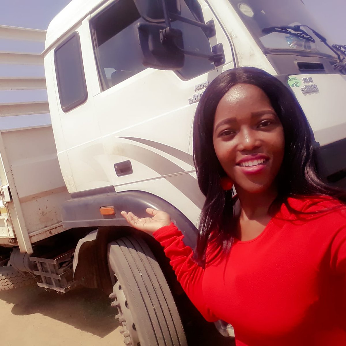 ChomiYaJeso's tweet photo. This couple is winning the #LookAtGodChallenge sister is near a truck working and brother is riding a bus to work. https://t.co/RgarAHL1O9