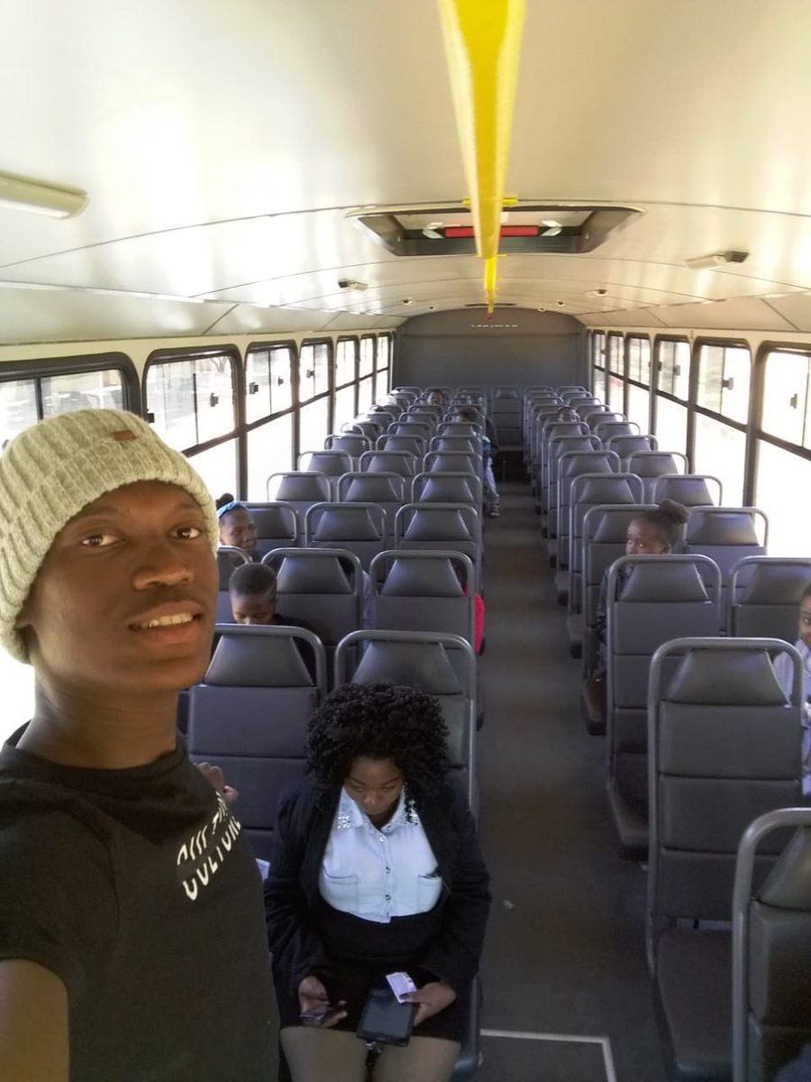 ChomiYaJeso's tweet photo. This couple is winning the #LookAtGodChallenge sister is near a truck working and brother is riding a bus to work. https://t.co/RgarAHL1O9