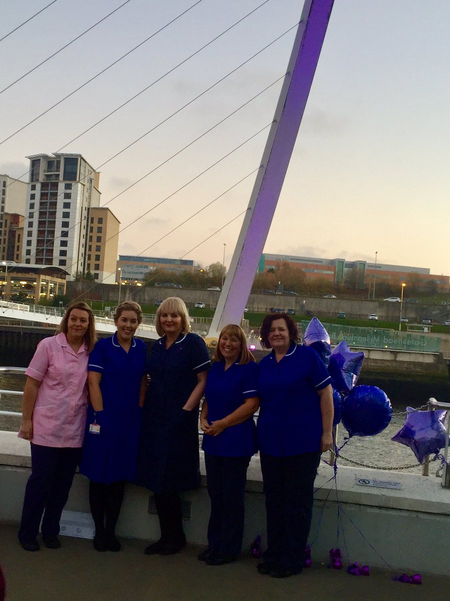 TinyLivesTrust's tweet photo. As the sun set on @NEWCASTLEQUAYS, we were delighted to be joined by some of the amazing nurses from the RVI Neonatal Unit to celebrate #GatesheadMilleniumBridge turning purple for #WorldPrematurityDay. Thank you to the parents and babies who popped by to say hi as well! πππ https://t.co/8ADo6l1Prl