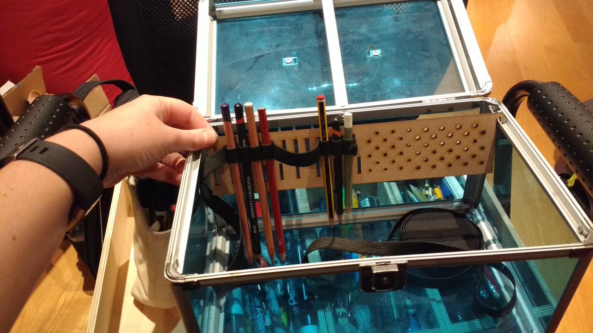 MoragHickman's tweet image. Eeee! I'm delighted with today's #makevember experiment. I have a lot of scattered art supplies and a little cd filing box. Just add elastic to this MDF test card and it becomes flexible modular storage! The elastic locks around the offcuts, quickly and easily. Pew pew! ✨💡✨