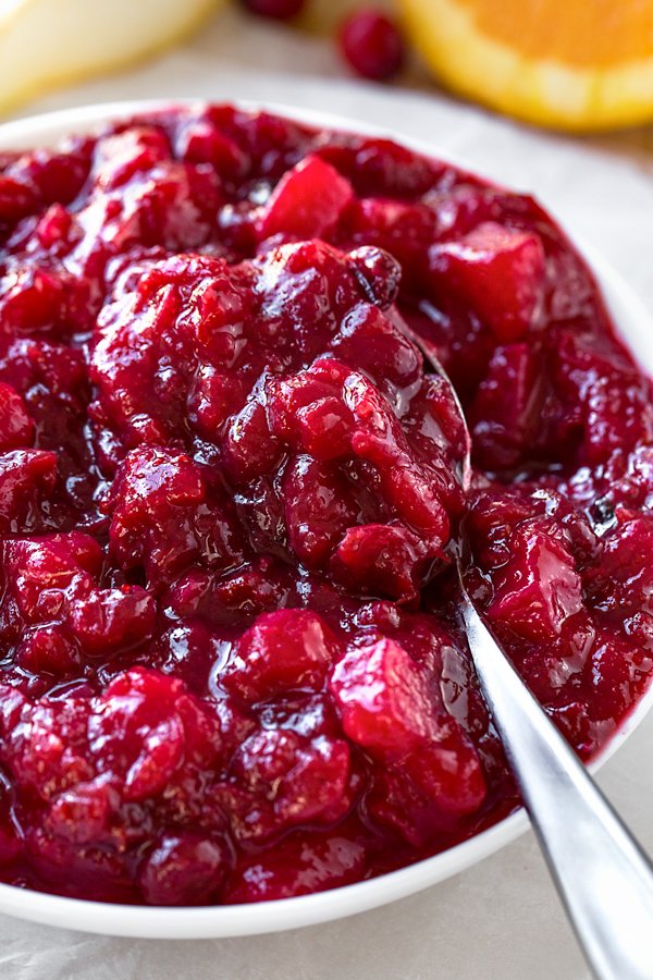 Homemade Cranberry Sauce is so much easier to prepare than you might think! If you've got 7 minutes, you're on your way to this ruby-red, sweet and tangy side dish that everyone will love!  thecozyapron.com/cranberry-sauc…