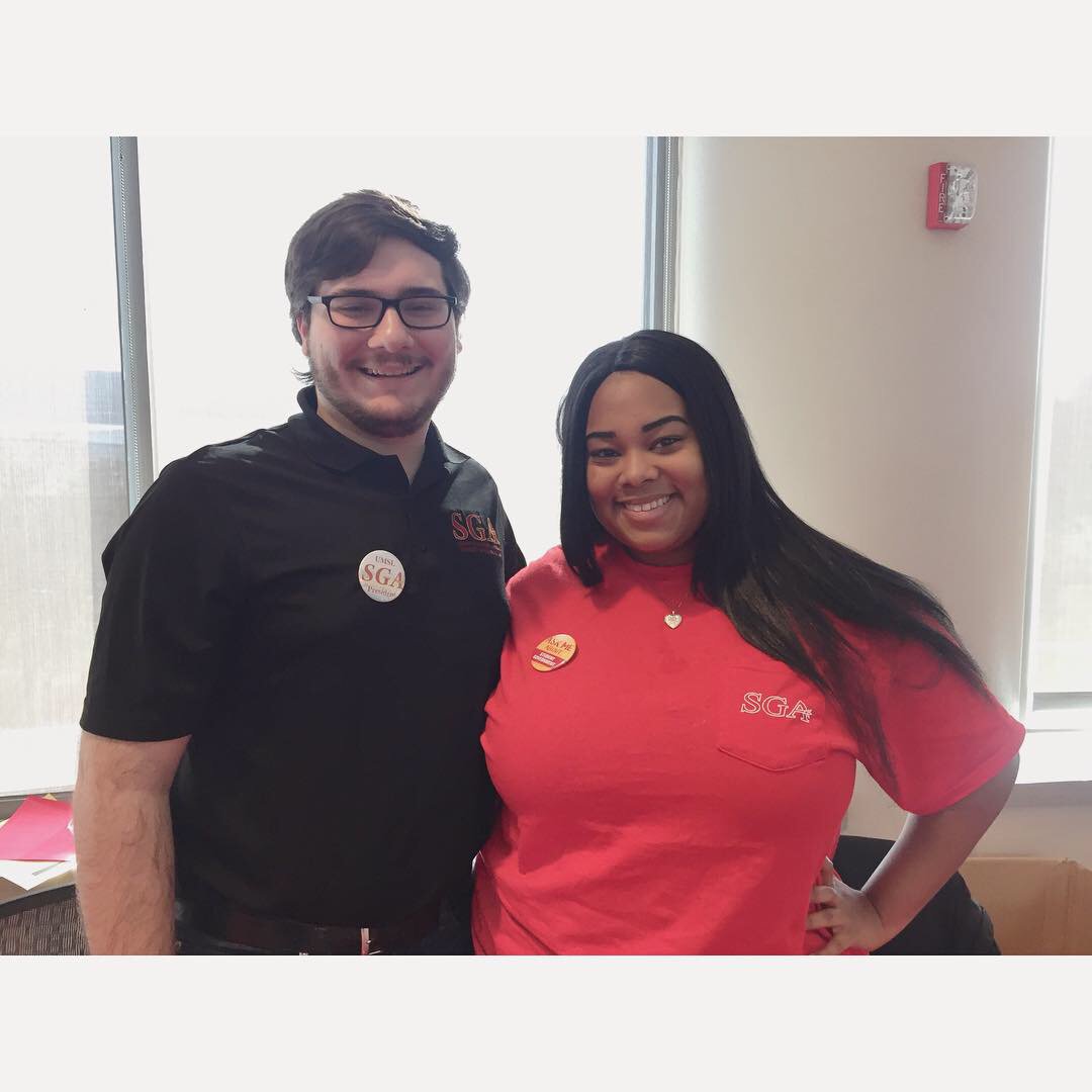 Today you can find our President (Joey) and Vice President (Aleathea) tabling at UMSL Day until 2 ❤️🔱 #GoTritons