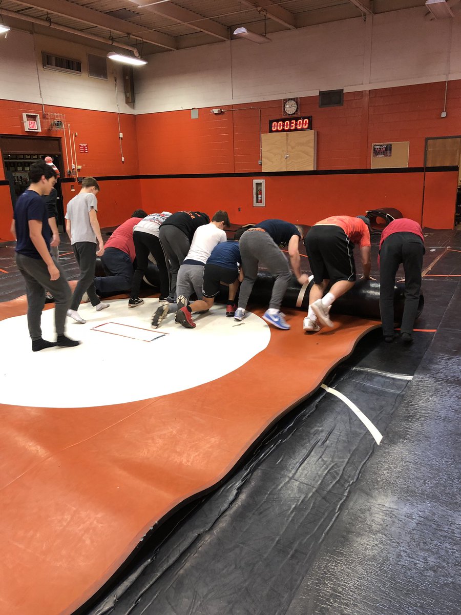 _FunkMasterFlan's tweet photo. As the 🐛 becomes a 🦋, so too, the Aux gym becomes a wrestling room. Painstaking process that literally takes ~200 man hours but isn’t so bad when you have about 20 guys show up for 6 hours on a Saturday to help. #gratefulformyteam @VillePioneers Out w/ the old. In w/ the new! https://t.co/g5SEpuBwwj
