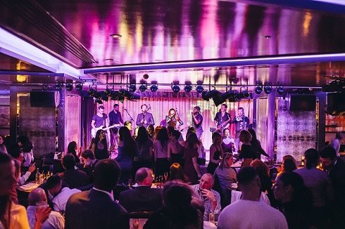 astonmead's tweet photo. A very enjoyable evening @100WardourSt with excellent hosting from Chris, Luke and the team from #devinehomes Great service, a really buzzy venue and the house band were superb. Not sure shots at 2am were advisable! 🤢 https://t.co/Es6ek049B7