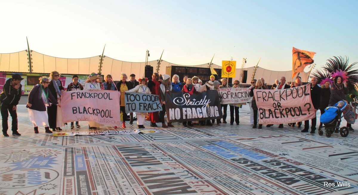 GinaDowding's tweet photo. Earlier today in #Blackpool as @bbcstrictly fans were queuing at the Tower ... we made our message clear...#Strictly fun #StrictlyNoFracking in solidarity with #ExtinctionRebellion https://t.co/Y63CuptSae