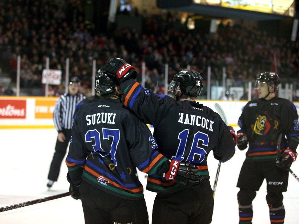 GregCowanST's tweet photo. Nick Suzuki and Kevin Hancock celebrate in their @AttackOHL #CubsForCancer jerseys after Hancock's first period power play goal. Owen Sound leads Flint 1-0 after 20 minutes. https://t.co/18WLjCvzrW