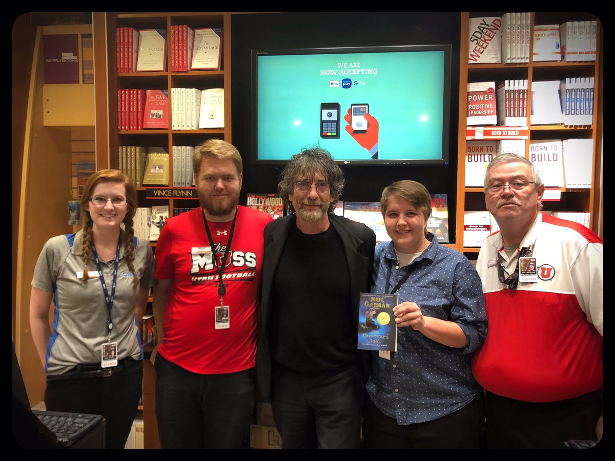 neilhimself's tweet photo. I was apprehended signing books in Salt Lake City airport. In punishment I had to sign all the other books they had in the back as well. https://t.co/n1xz12ouZz