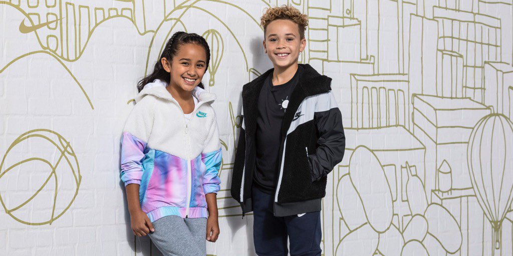 Nike's tweet photo. The new Nike Gift Guide. Where to find the perfect gift for every athlete on your list. Shop it now https://t.co/V5RL6eE5KR https://t.co/iSmF4thbYr