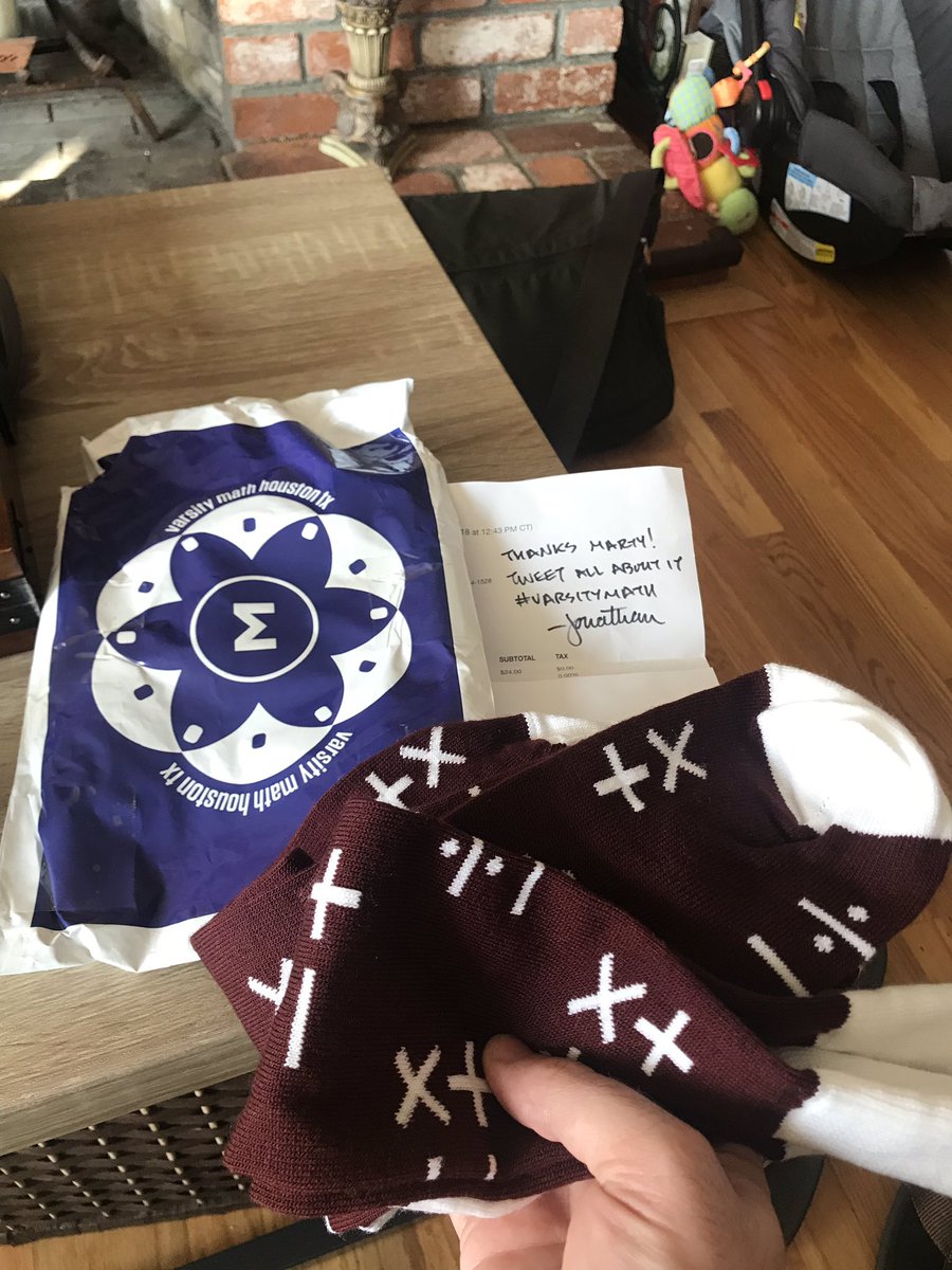 martinsean's tweet photo. My #varsitymath socks came. My colleague is going to be delighted when I give him a pair! https://t.co/pXUL4UJ0tl
