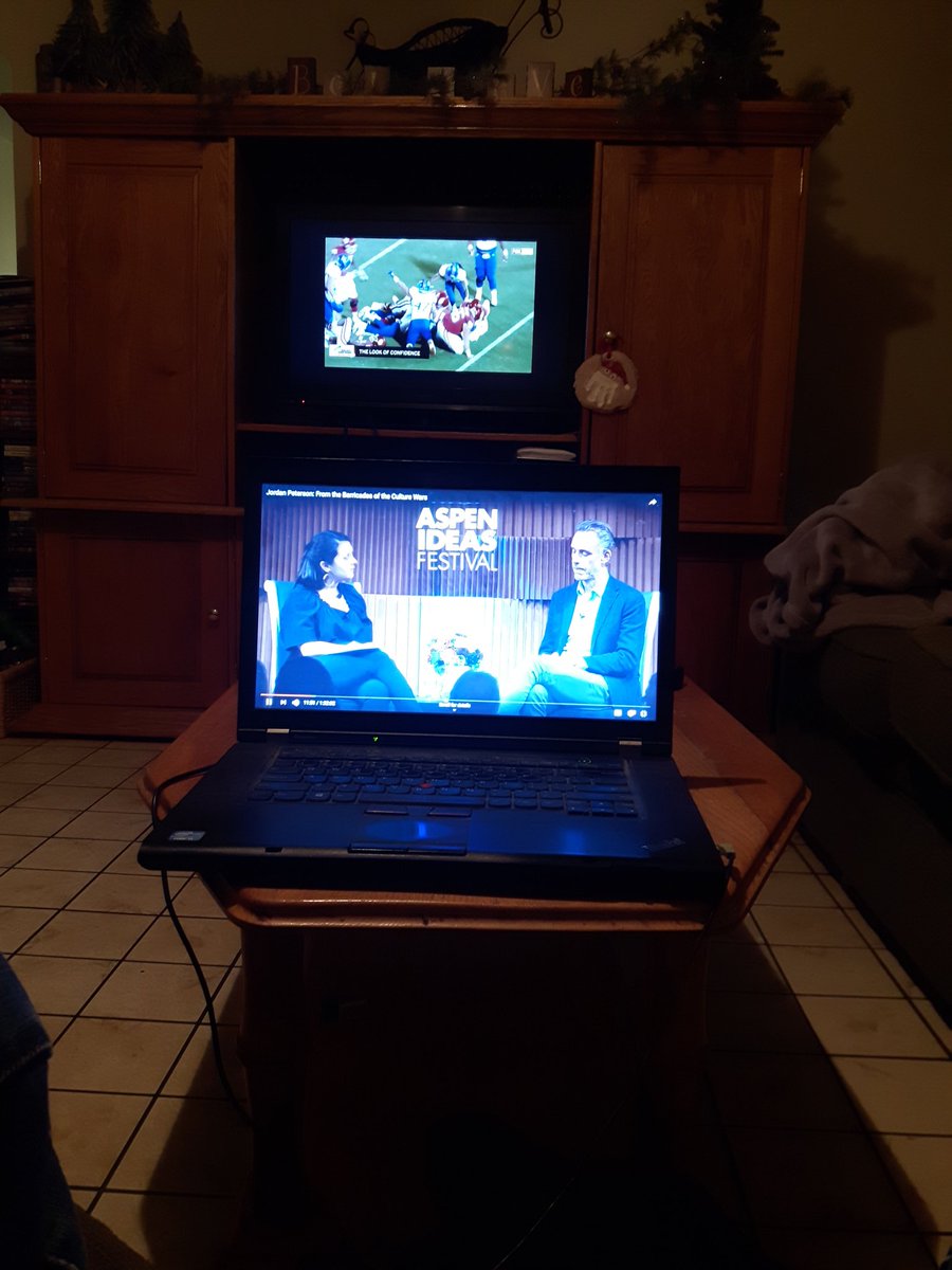 Hearnsy's tweet photo. @jordanbpeterson hopefully the future of Canadians. Technological aided reeducation and reverse social  indoctrination;  Football game on mute JBP turned up. Thank you for your courage and sacrifice. #backtothefacts https://t.co/WY0xvHZopQ