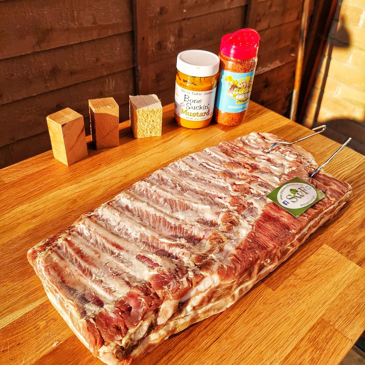 Sun was just coming up as I took these pics giving them a nice warm glow.
Rack of <a href="/SherwoodFoods1/">Sherwood Foods</a> St Louis ribs getting slathered with <a href="/BoneSuckinSauce/">Bone Suckin' Sauce - Official</a> mustard then rubbed up with <a href="/MeatChurch/">Meat Church ™</a> Holy Gospel (Thanks to @BIGOJS )
Then hung in the new <a href="/ProQSmokers/">ProQSmokers</a> Excel Elite to smoke.