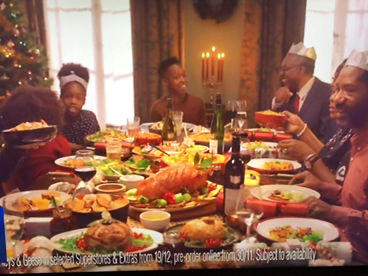 AmandaLevett's tweet photo. @tesco great Christmas ad, but family are wearing cracker hats though crackers still whole, and plates loaded whilst the food on serving plates is untouched. Details!* https://t.co/o1aAoRutls