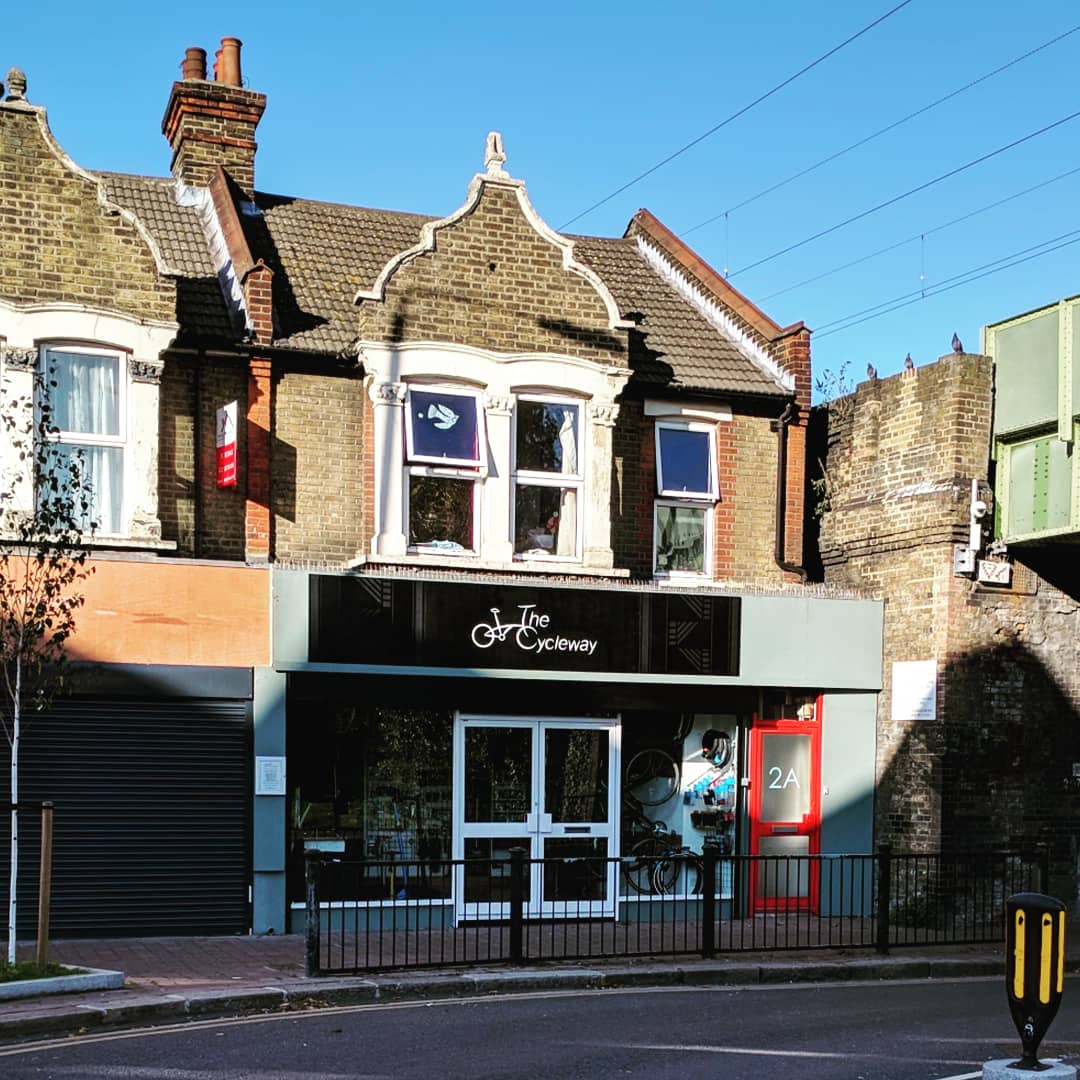 Our shop sign is up now, thanks <a href="/asketchystory/">Ruth Craddock</a> for the amazing artwork.
Big thanks to the North Star Velo team for the ladders and helping putting the sign up. Matt &amp; Lucy for preparing the shop front and friends and family that are always helping us in our DIY projects.