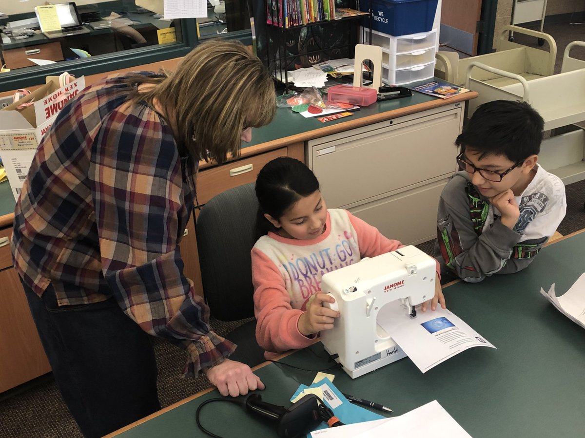 OPSChandlerView's tweet image. Our library #paraprofessional taking time to teach students sewing skills. The students were curious &amp;amp; she offered to show them. @OmahaPubSchool @OPS_Libraries @HardyJoycelyn @NElovesPS #CVStrong