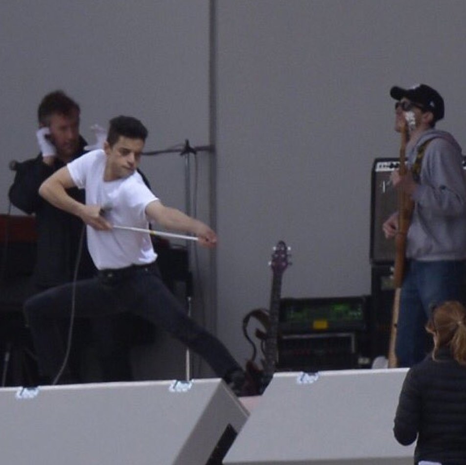 queenxstan's tweet image. i'm so in love with these pictures of rami on the set of borhap, god look at him